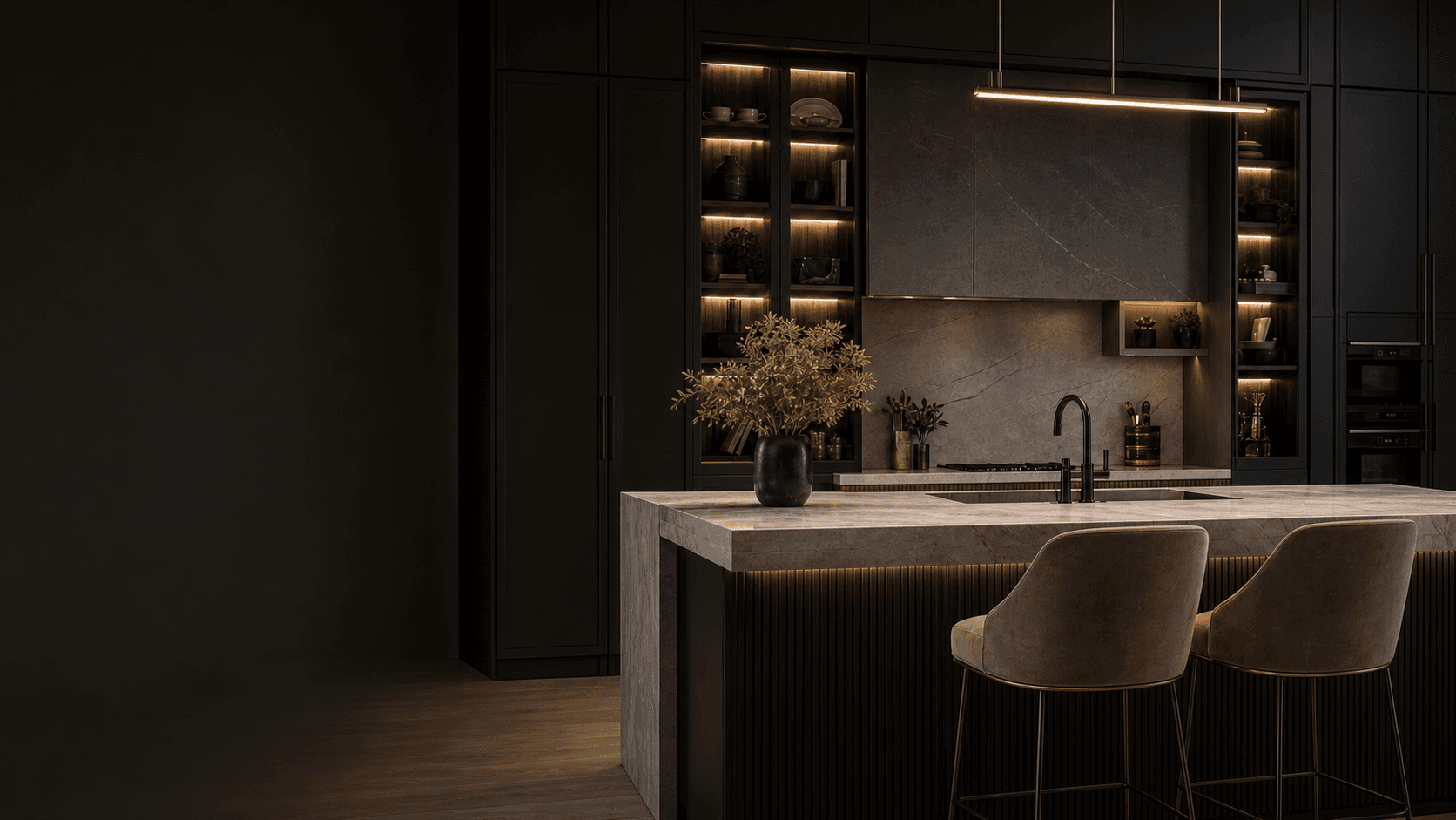 Luxury dark kitchen with quartz island and illuminated cabinetry